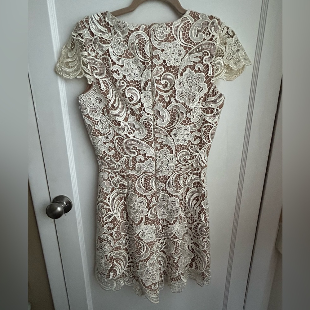 Cream color lace romper. Excellent quality